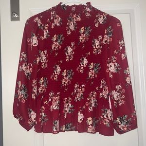 Never worn Rouched mock neck peplum top from Francesca’s